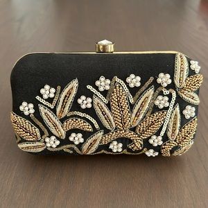 Black embroidered clutch